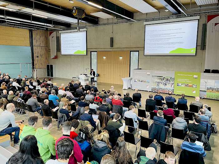 Vortragspublikum und Referent